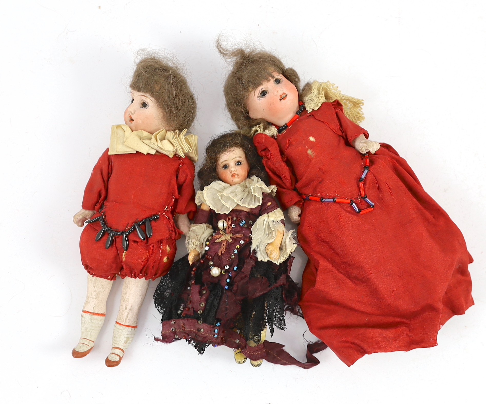 A pair of Recknagel bisque headed dolls, German, circa 1900, 8in. (4)